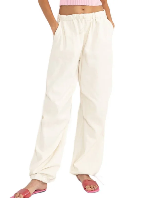 Women's Tight Trousers with Elastic Waistband in Black for Easy and Comfortable WearDenim Parachute Pants In Cream Women's Tight Trousers with Elastic Waistband in Black for Easy and Comfortable WearDenim Parachute Pants In Cream
