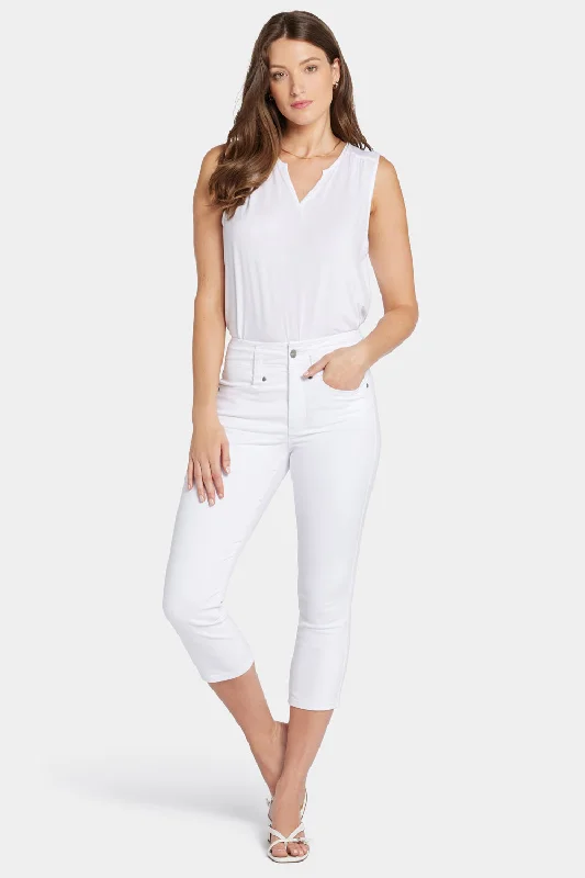 Colored women jeans in vibrant hues like red and yellowAmi Skinny Capri Jeans - Optic White Colored women jeans in vibrant hues like red and yellowAmi Skinny Capri Jeans - Optic White