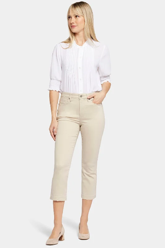 Distressed women jeans for a trendy and edgy lookChloe Capri Jeans In Petite - Feather Distressed women jeans for a trendy and edgy lookChloe Capri Jeans In Petite - Feather