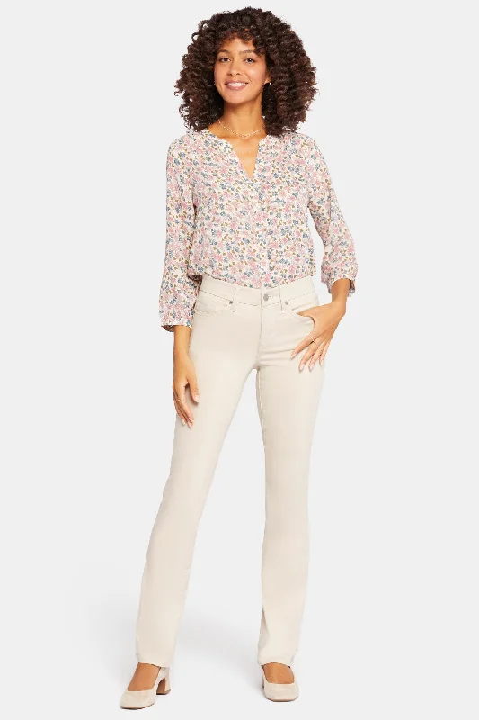 Ripped women jeans for a rebellious and fashion - forward styleWaist-Match™ Marilyn Straight Jeans In Petite - Feather