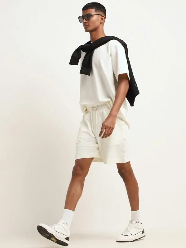 Cuffed Women Shorts for a Laid - Back and Trendy LookStudiofit Off-White Cotton Blend Relaxed Fit Bermuda Shorts Cuffed Women Shorts for a Laid - Back and Trendy LookStudiofit Off-White Cotton Blend Relaxed Fit Bermuda Shorts